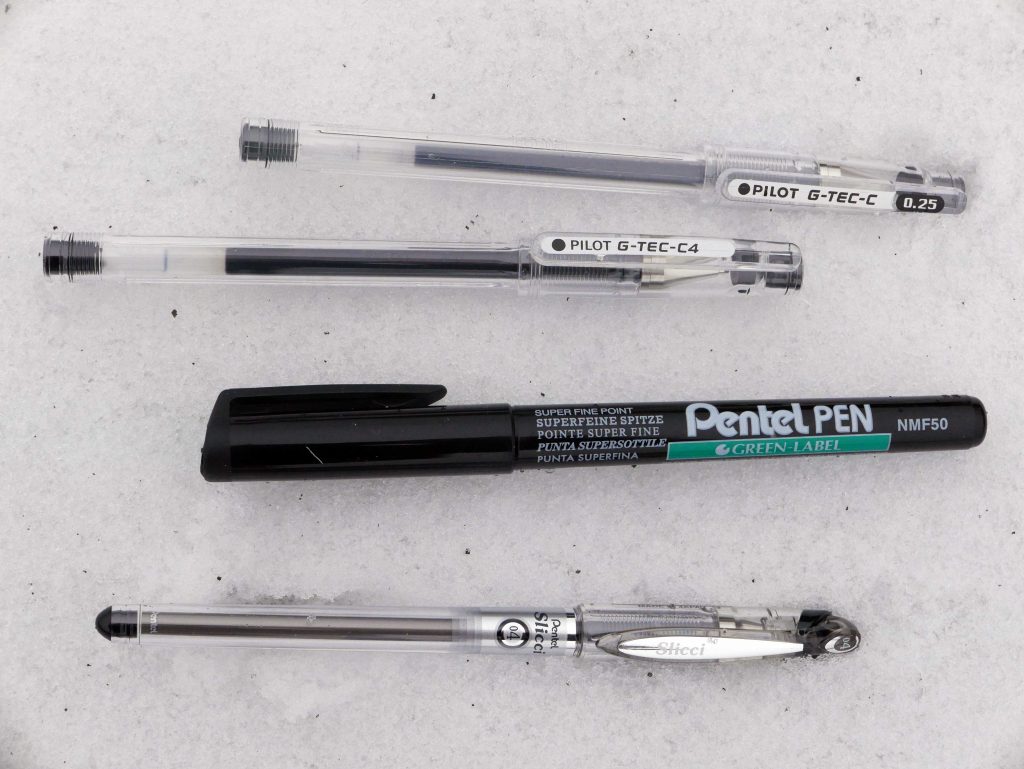 Architect's pens on the snow