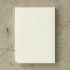 Midori paper pad on a table