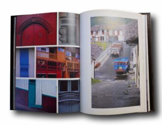 Photo showing a sample spread of the book Arquitectura de la Colonización Antioqueña