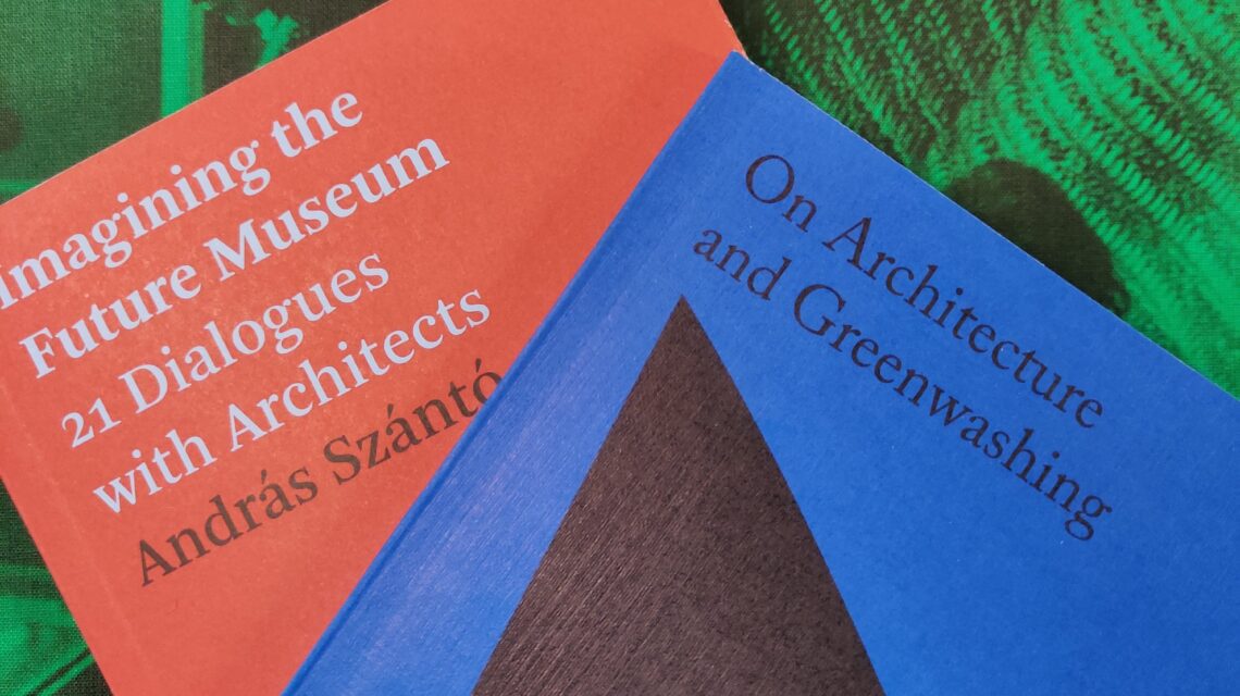 Blue, red and green book on top of each other